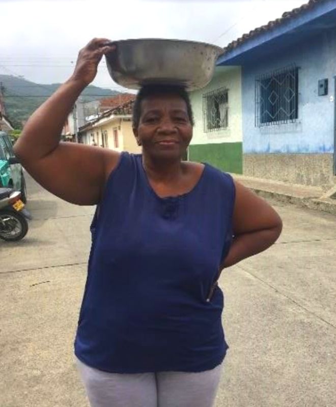 CRISTOBELINA: LA MUJER DEL CHONTADURO QUE SE ROBÓ EL AMOR DE LOS BUGUEÑOS Cristobelina, La mujer del chontaduro.